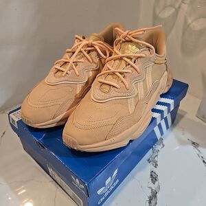 Adidas Orange Sneakers with Unique Lacing and Low-Top Design